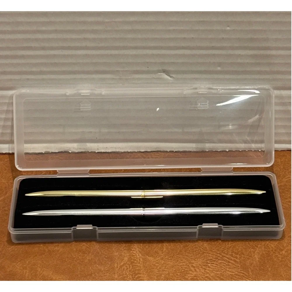 Vintage Slim Minimalist Metal Twist Pens 1 Gold and 1 Silver with storage case.